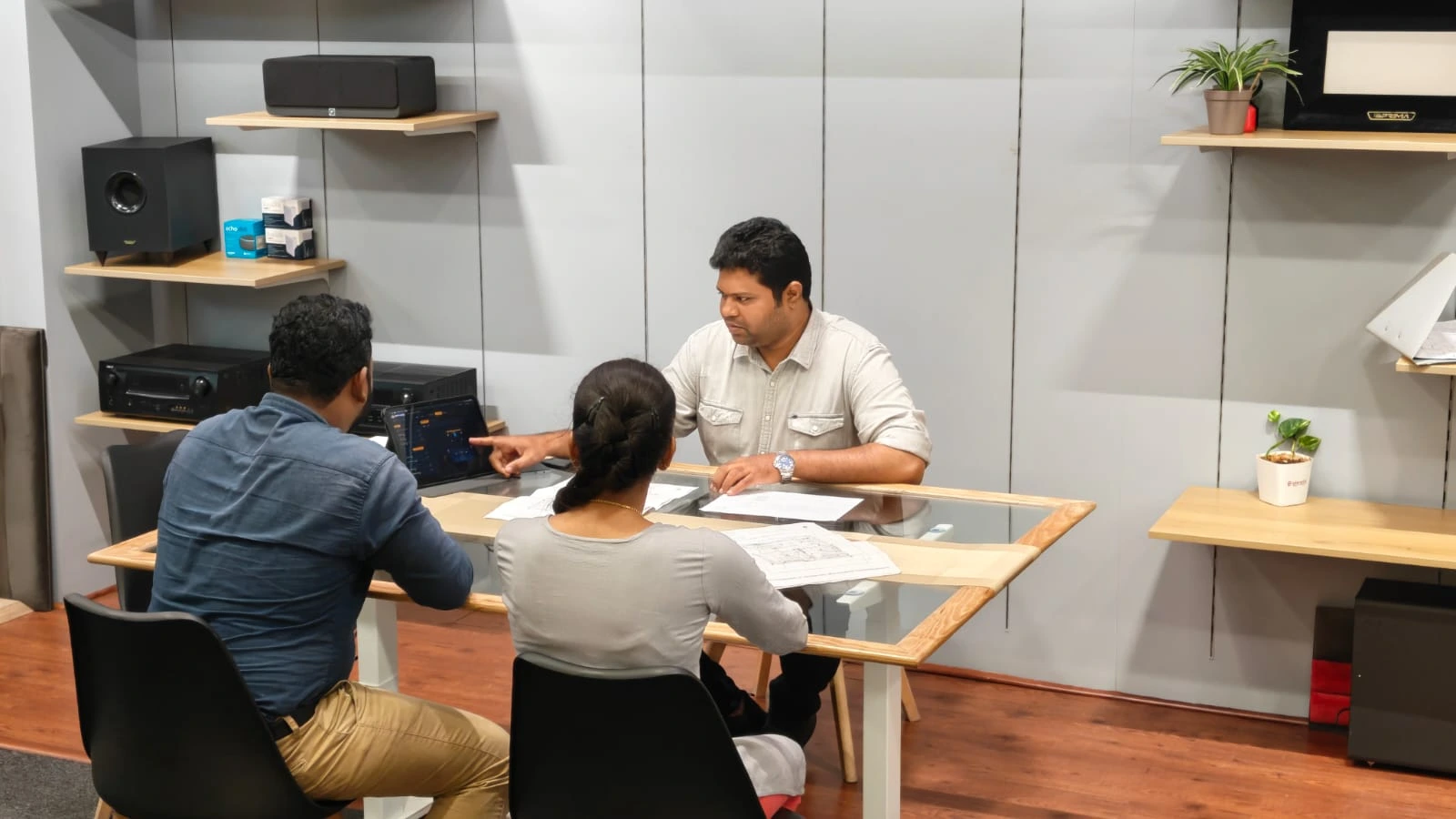 Consultation lounge at Auto-mate Solutions experience center where visitors receive same-visit budgetary quotes