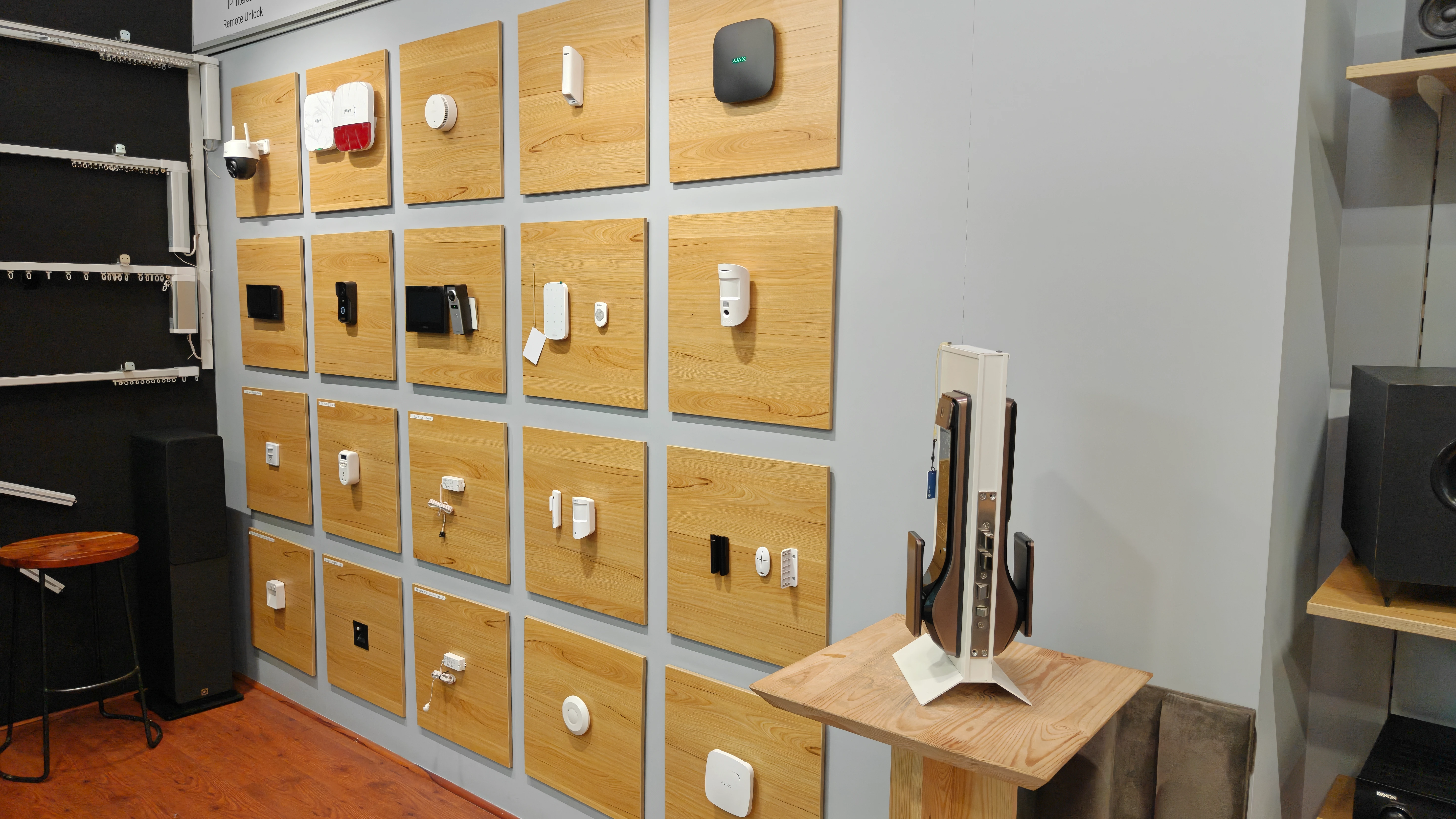 Security demonstration wall with live IP cameras, smart locks and video door phone at Auto-mate experience center